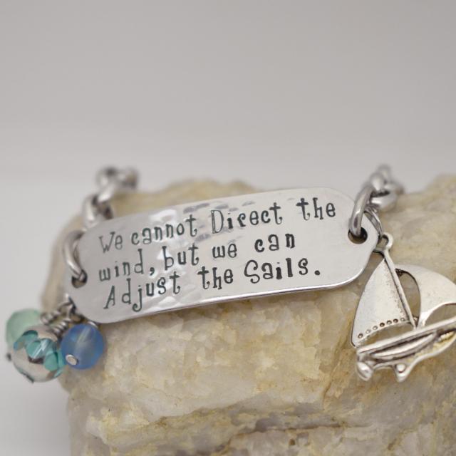 We Cannot Direct the Wind, But we can Adjust the Sails Inspirational Stainless Steel Bracelet w/Sailboat and Charms